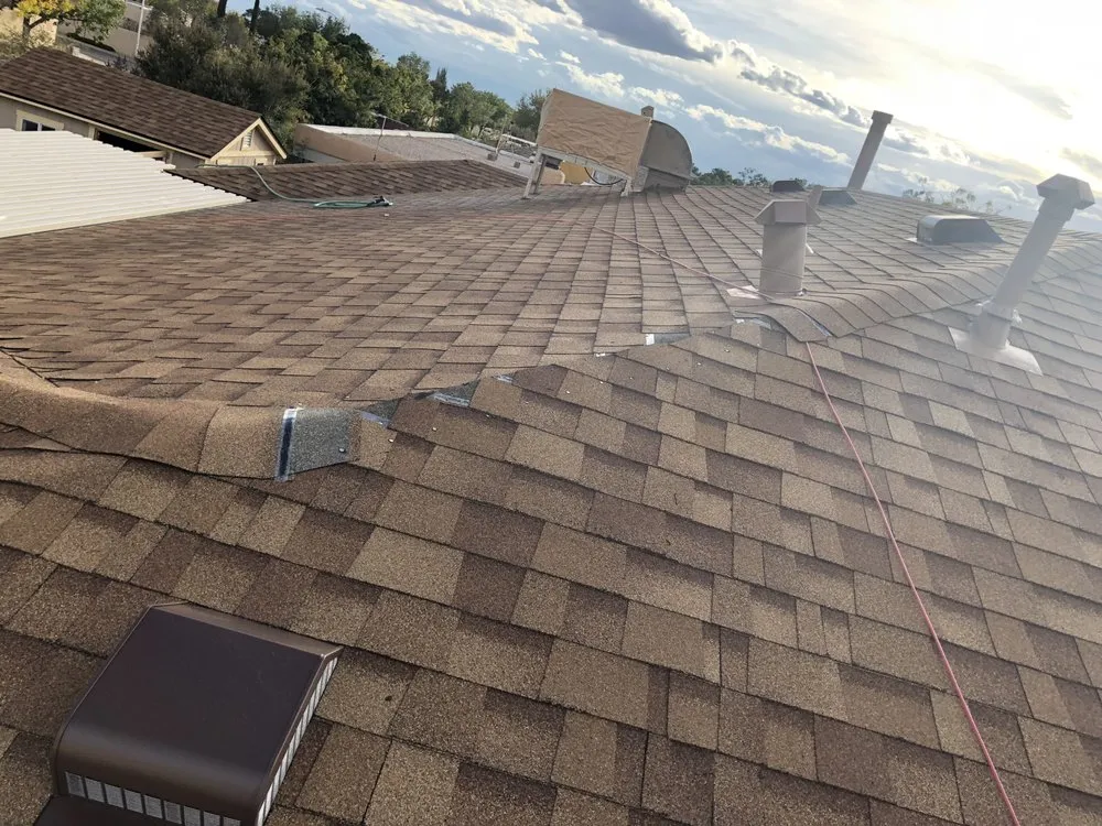 Slide of Quality Masters Roofing & Exteriors