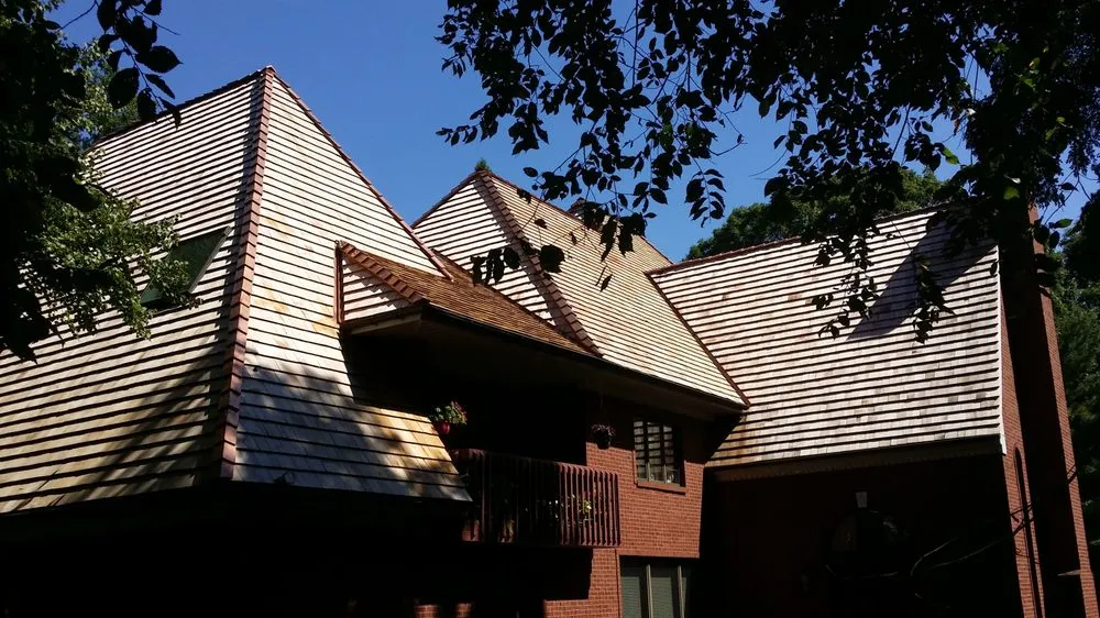 Slide of Quality One Roofing