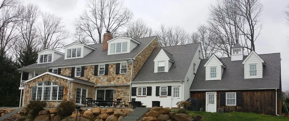 Slide of Quality One Roofing