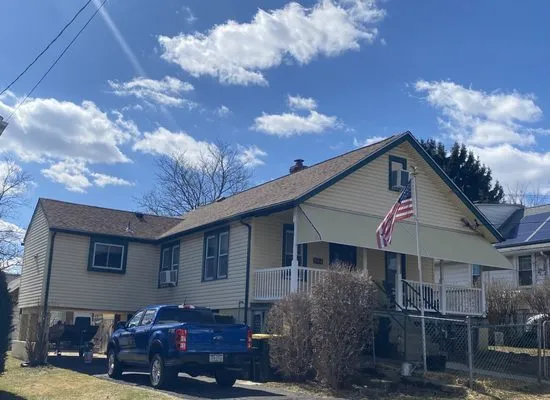 Quality One Roofing Logo