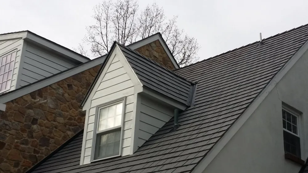 Slide of Quality One Roofing
