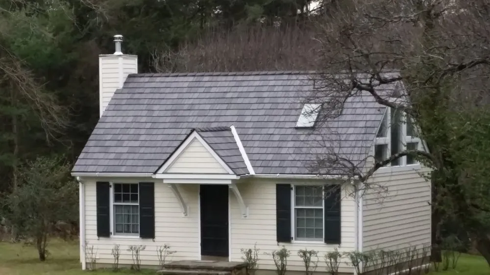 Slide of Quality One Roofing