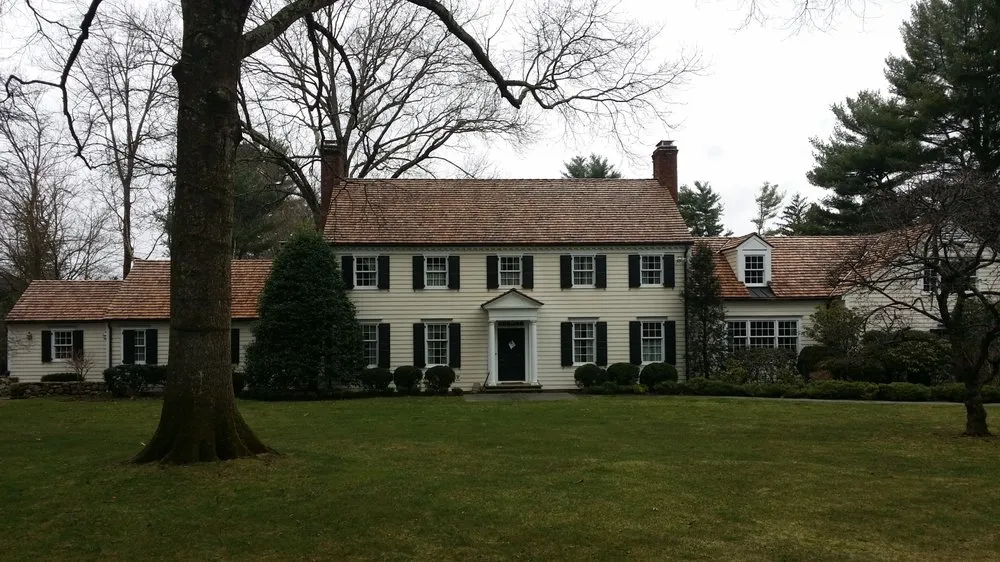 Slide of Quality One Roofing