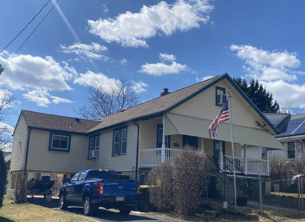 Slide of Quality One Roofing