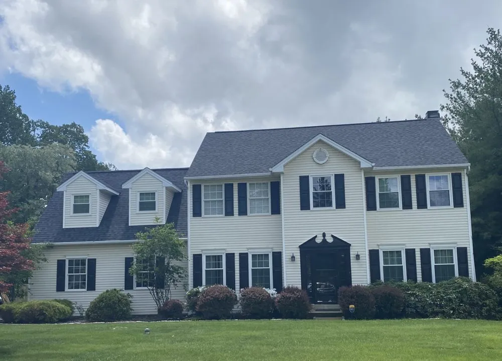 Slide of Quality One Roofing