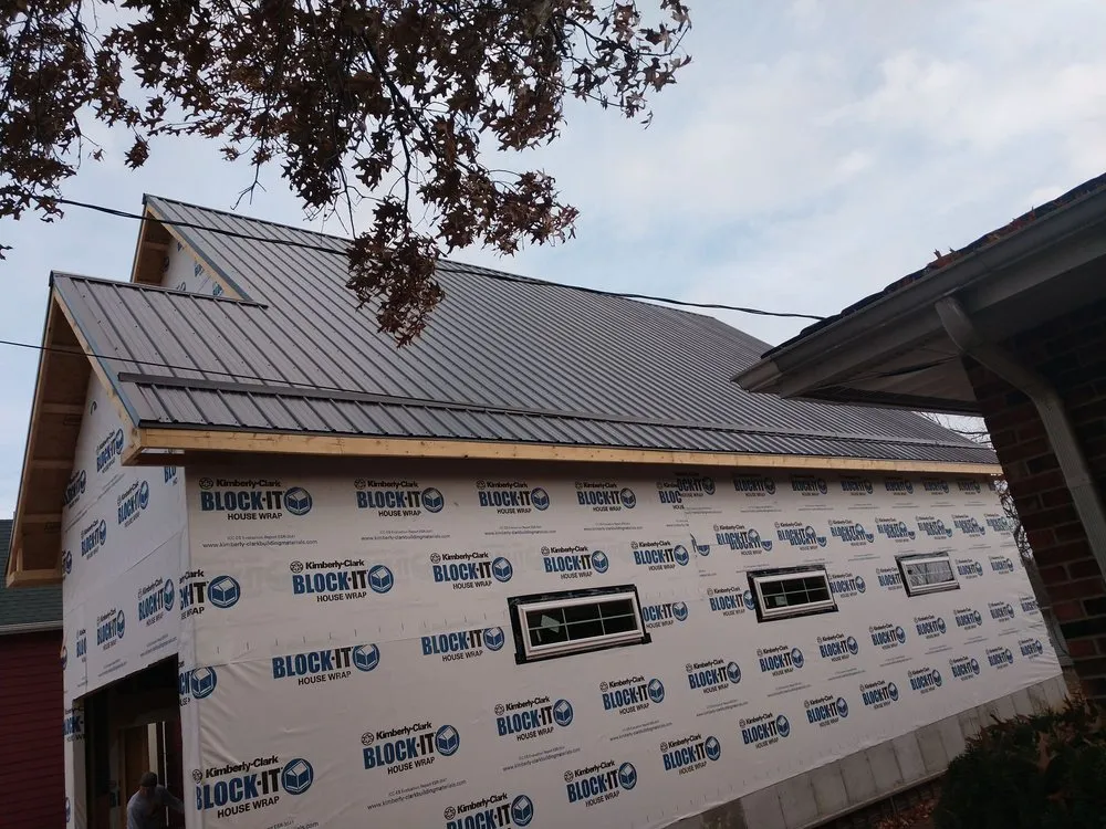 Emergency storm damage roof repair in Lowry City, MO by Quality Pro Roofing