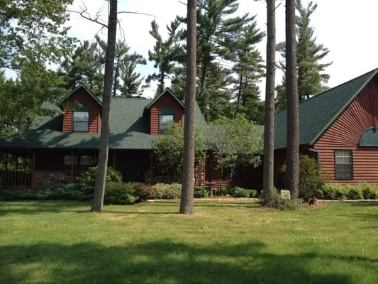 Quality Roofing & Improvements Logo