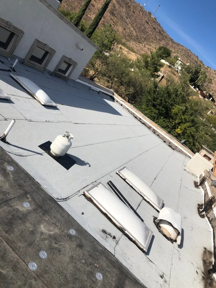 Slide of Quality Roofing & Painting