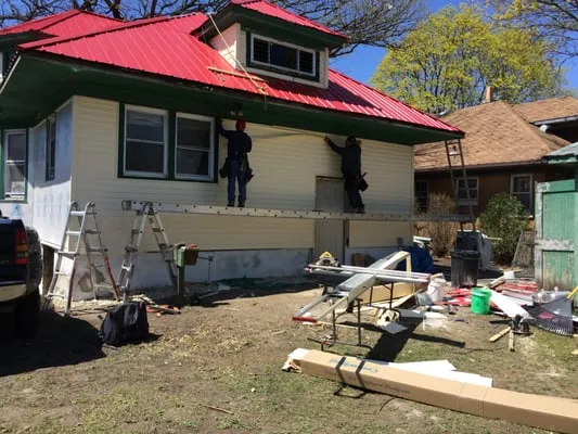 Quality Roofing & Remodeling Logo