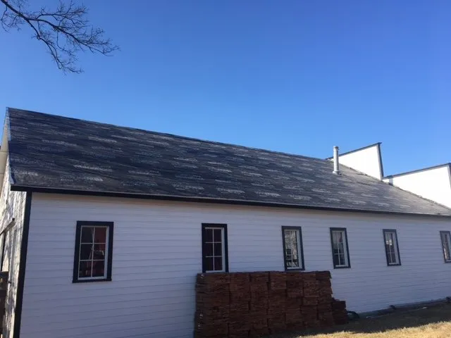 Slide of Quality Roofing & Restoration