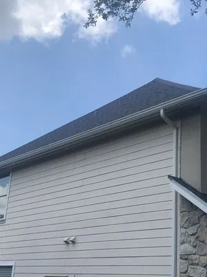 Quality Roofing And Contracting Logo