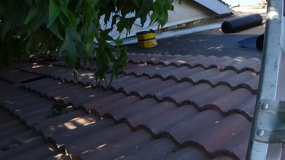 Slide of Quality Roofing Company