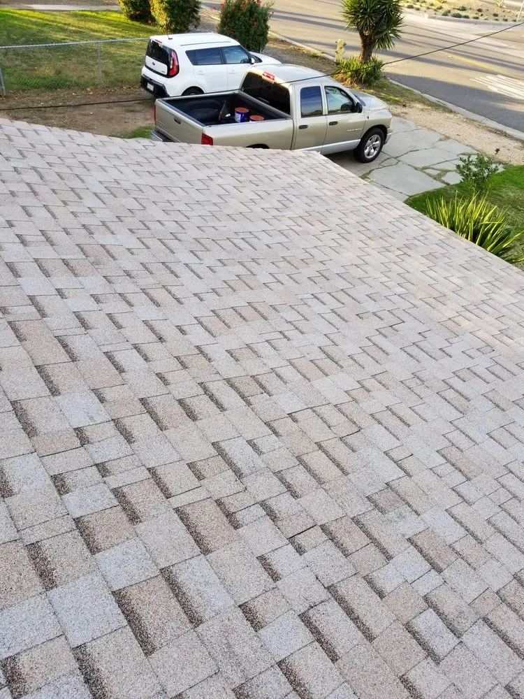 Slide of Quality Roofing Company