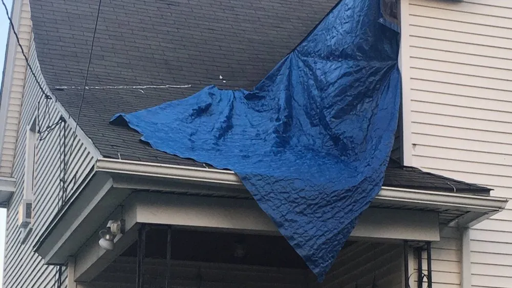 Slide of Quality Roofing Express