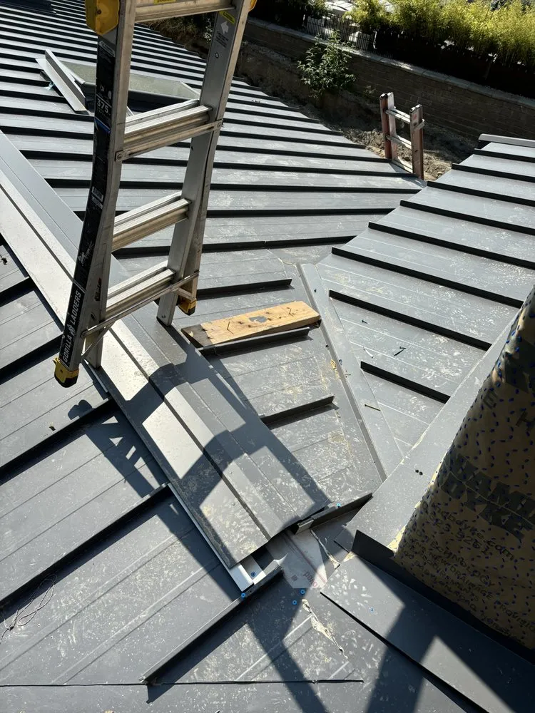 Slide of Quality Roofing NW