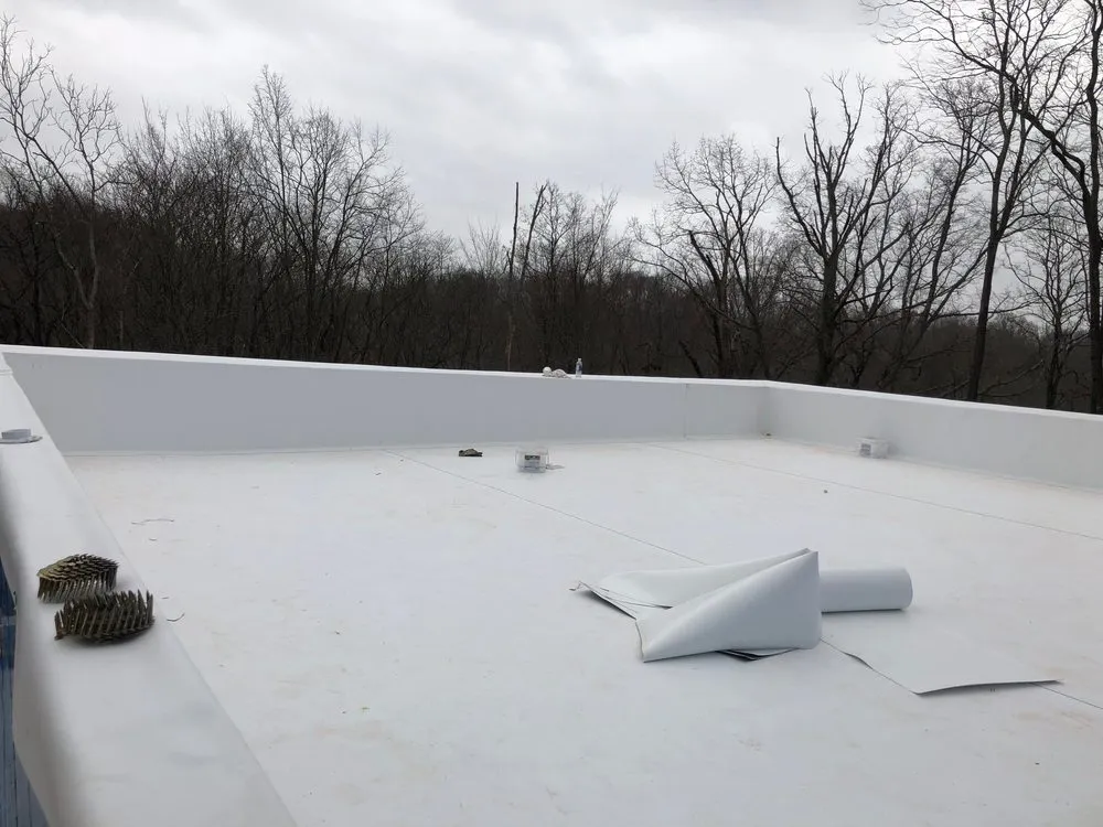 Slide of Quality Roofing TCS