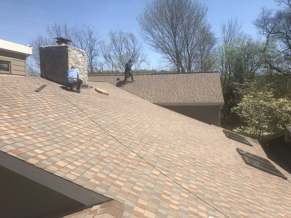 Slide of Quality Roofing TCS