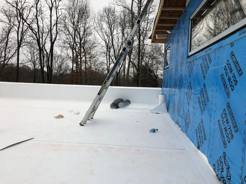 Slide of Quality Roofing TCS