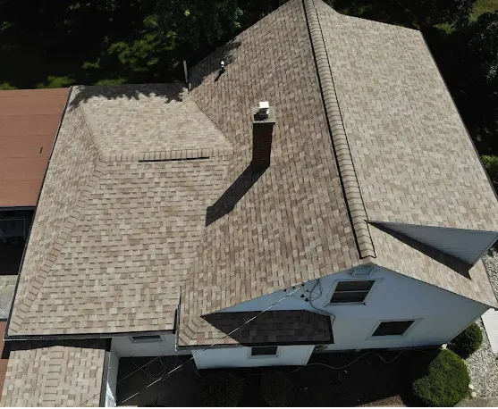 Slide of Quality Roofing Tecumseh