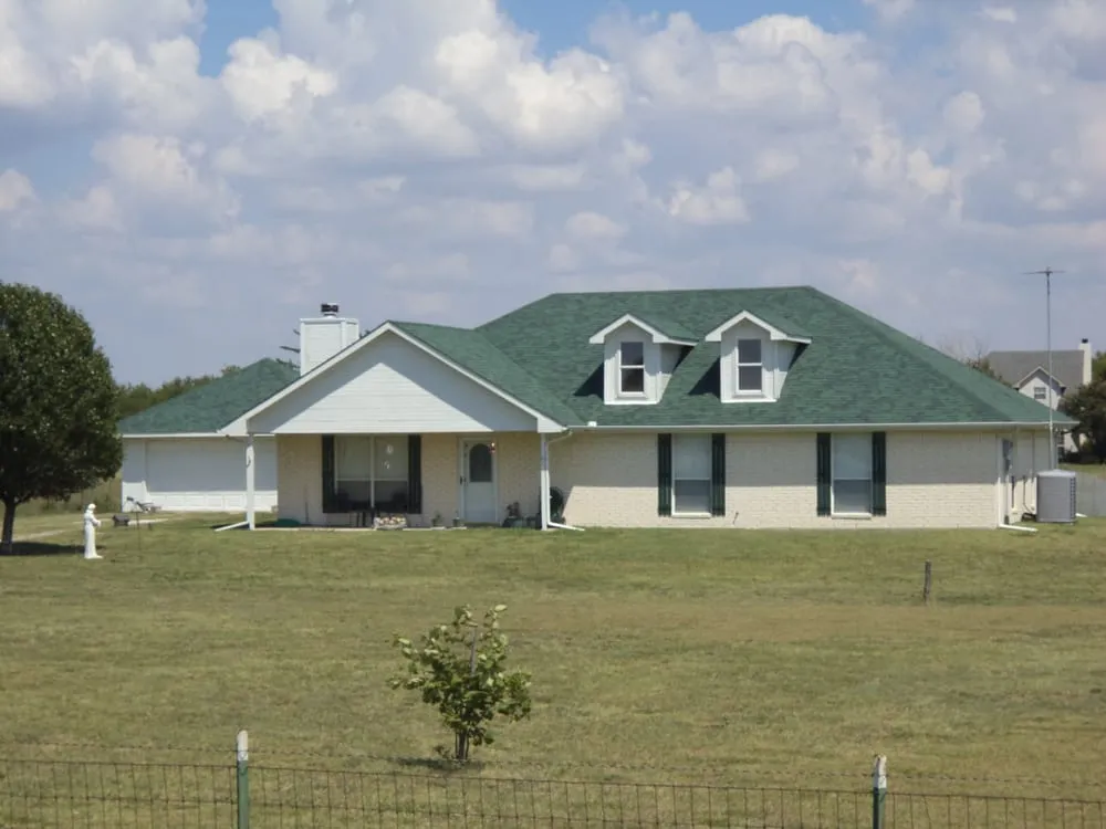 Slide of Quality Tops Roofing