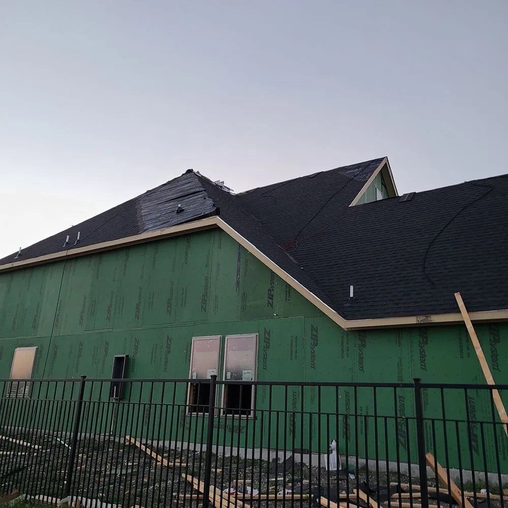 Slide of Quantum Roofing and Construction