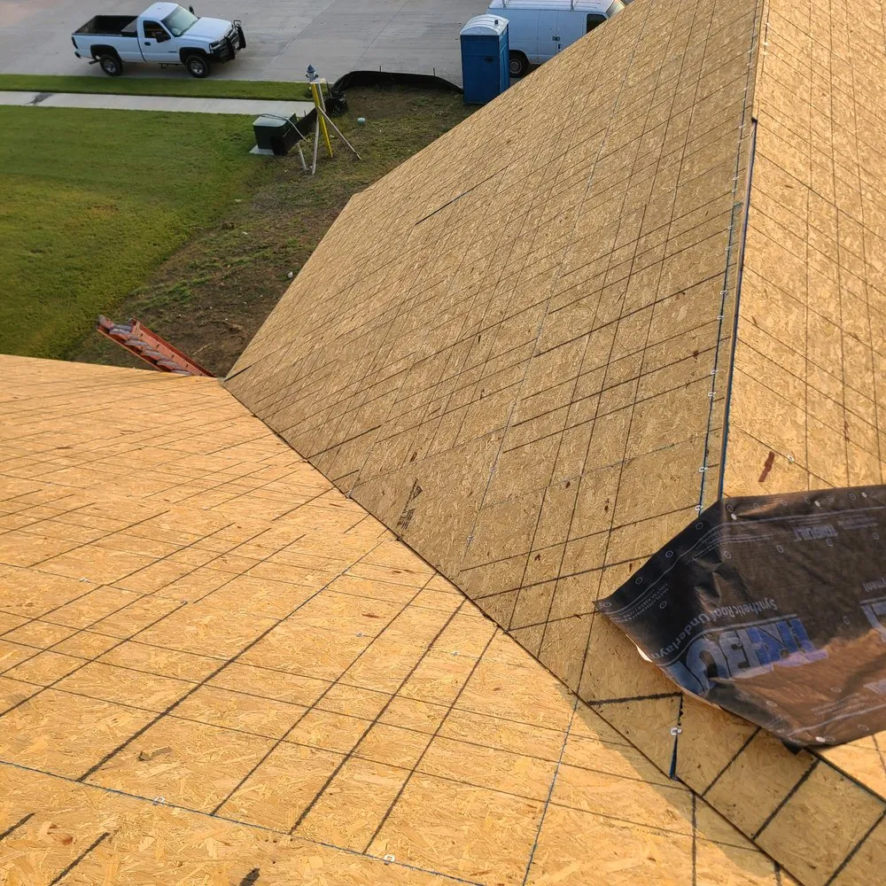 Slide of Quantum Roofing and Construction