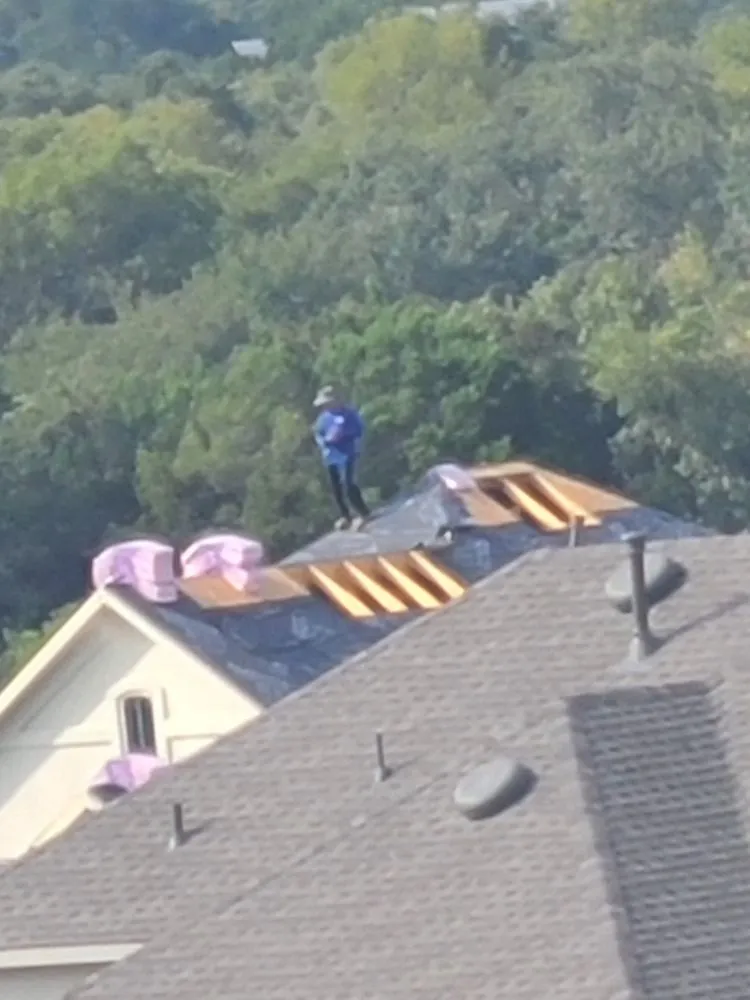 Slide of Quantum Roofing and Construction