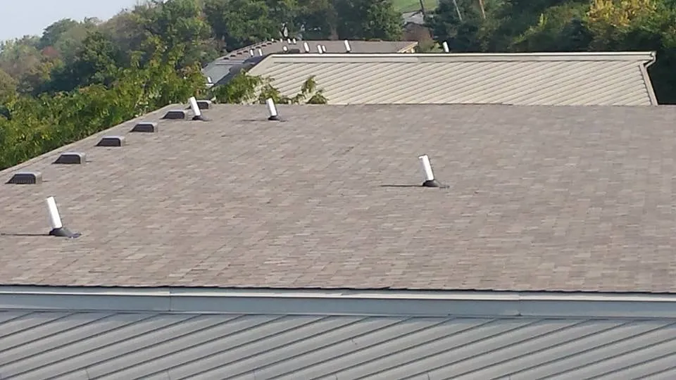 Slide of Queen City Roof and Repair