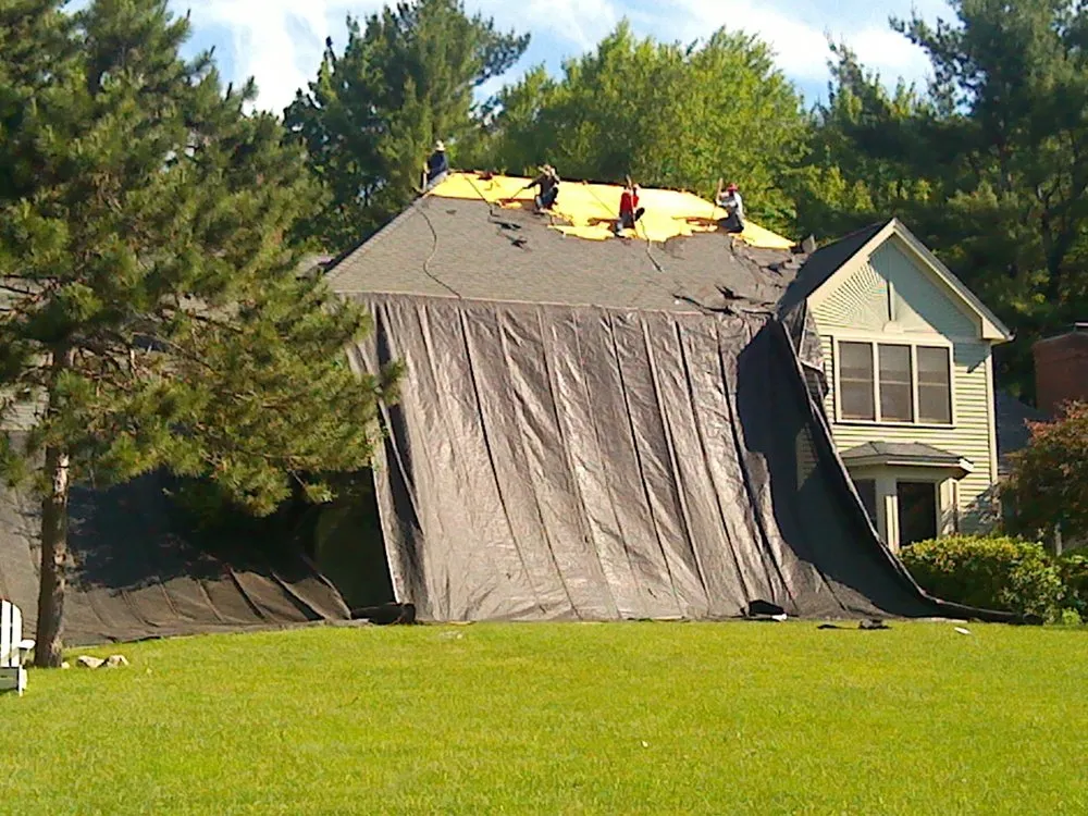 Slide of Queen City Roofing