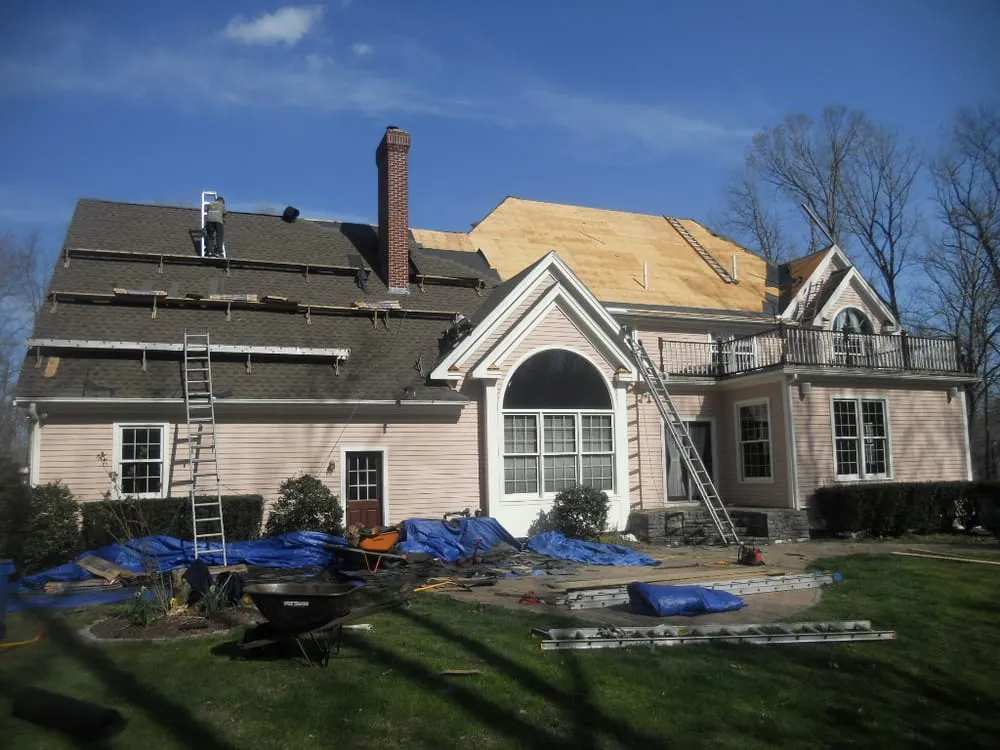 Slide of Queen City Roofing