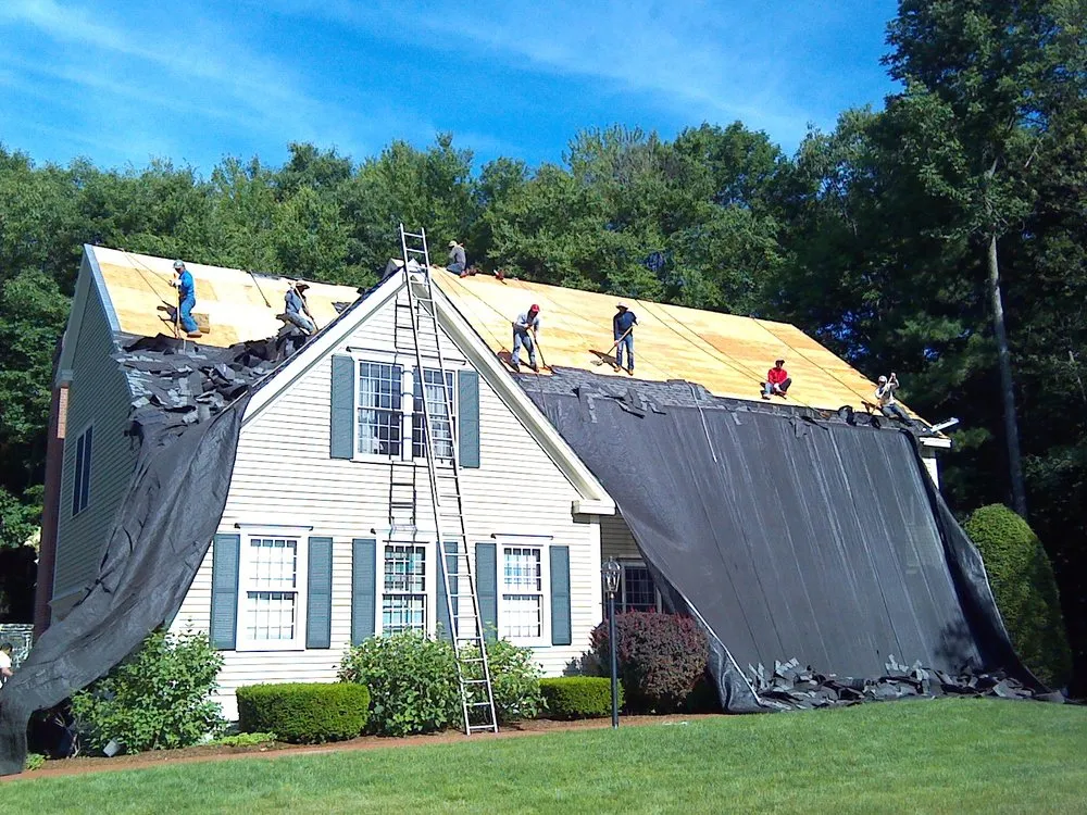 Slide of Queen City Roofing