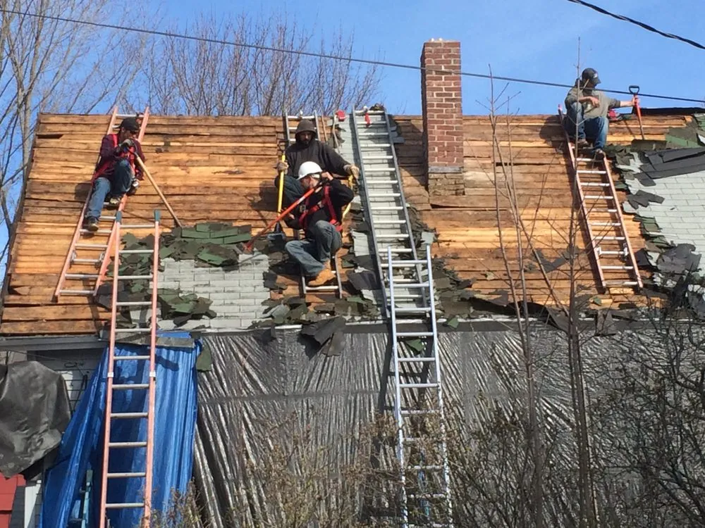 Slide of Queen City Roofing