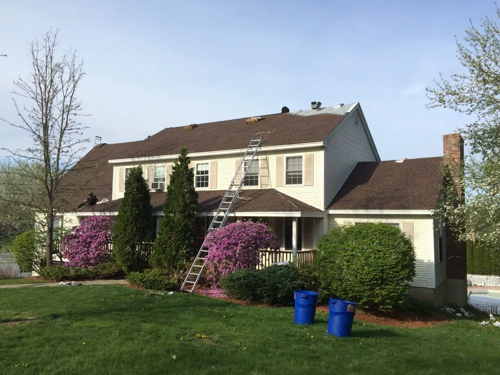 Slide of Queen City Roofing