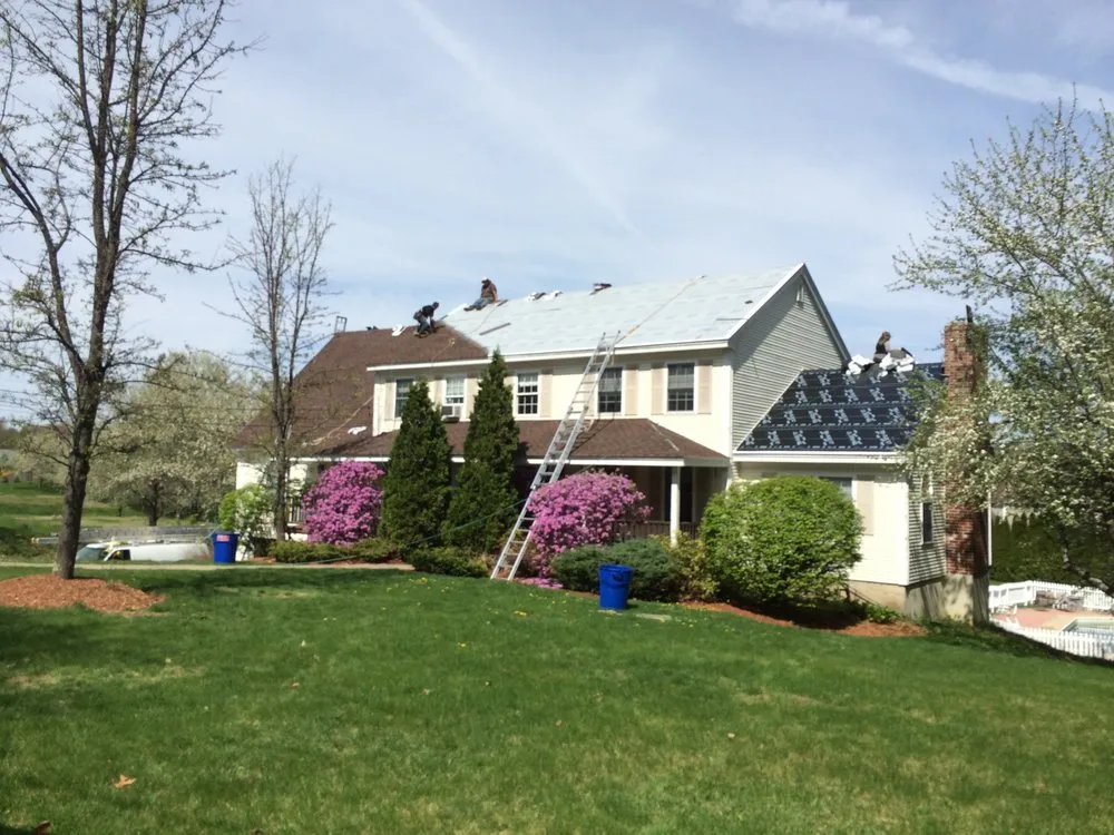 Slide of Queen City Roofing