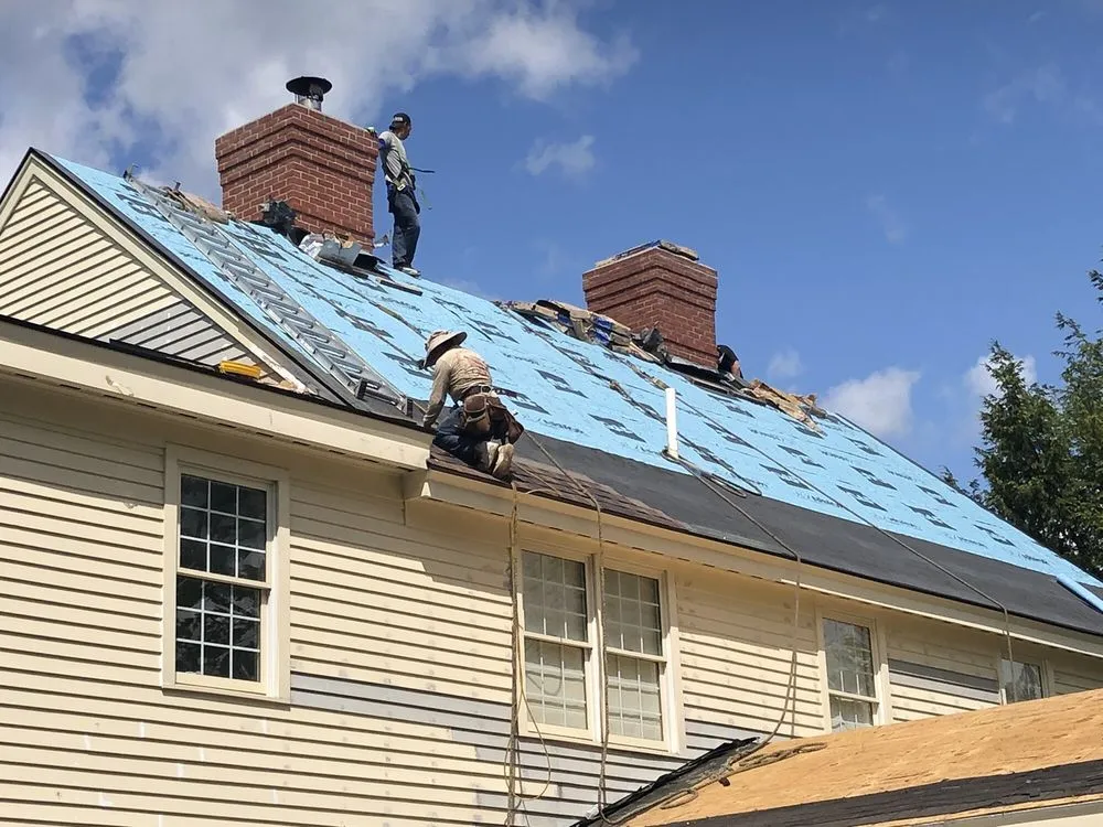 Slide of Queen City Roofing