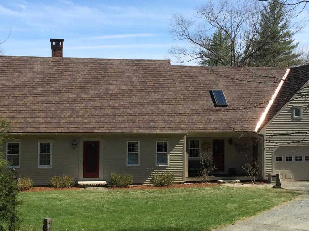 Slide of Queen City Roofing