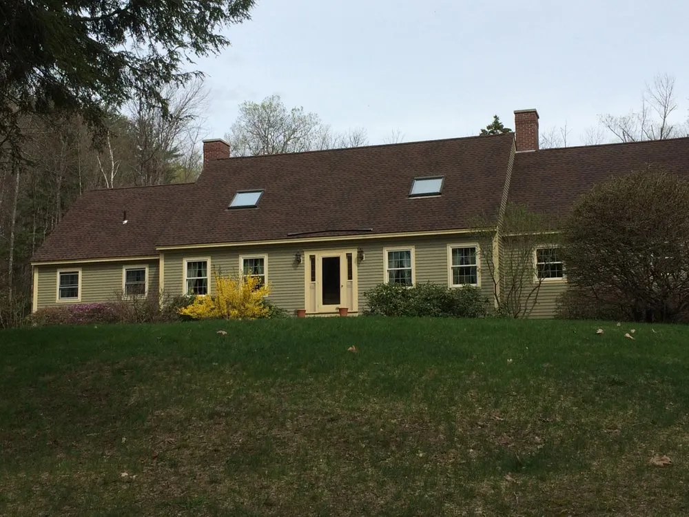 Slide of Queen City Roofing