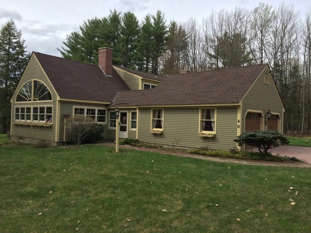 Slide of Queen City Roofing