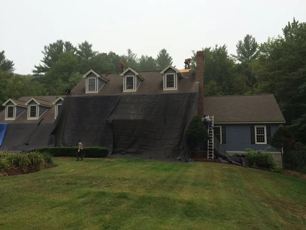 Slide of Queen City Roofing