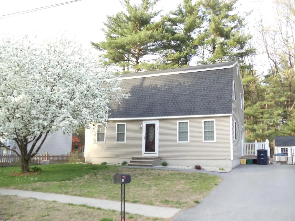Slide of Queen City Roofing