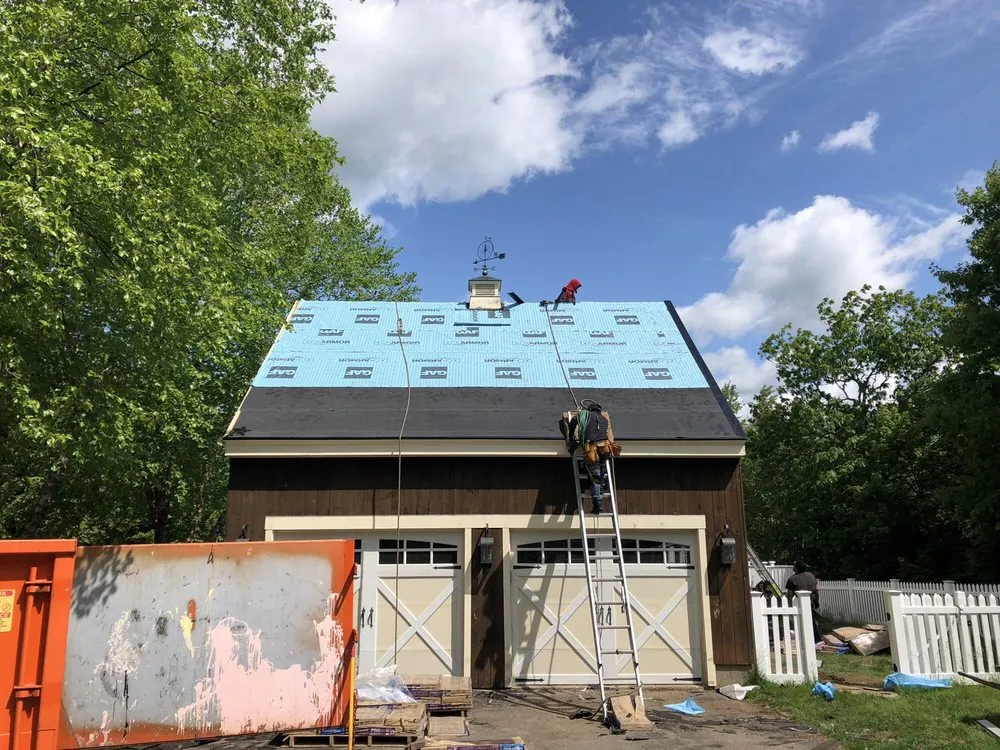 Slide of Queen City Roofing