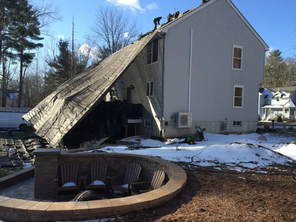 Slide of Queen City Roofing