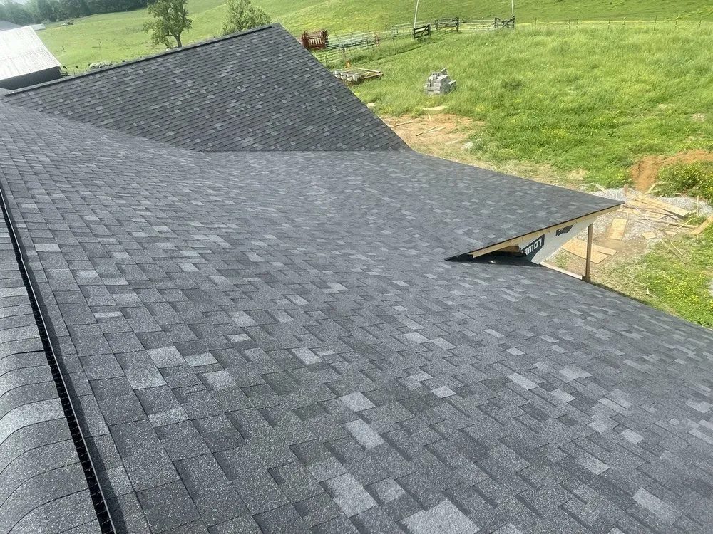 Slide of Queen Eagle Roofing