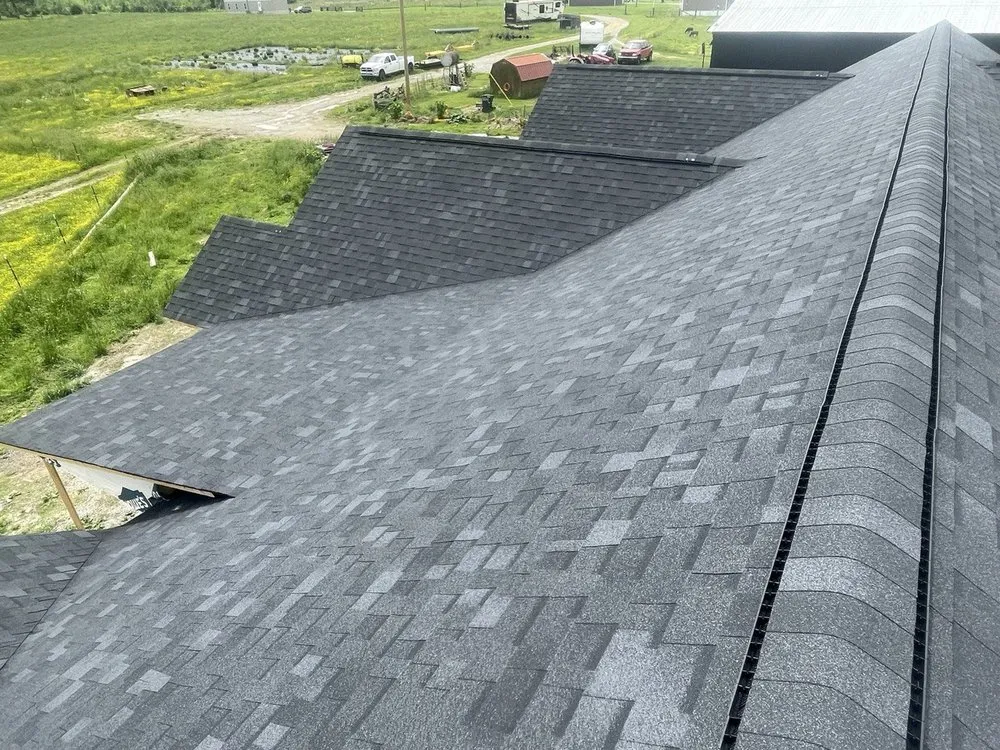 Slide of Queen Eagle Roofing