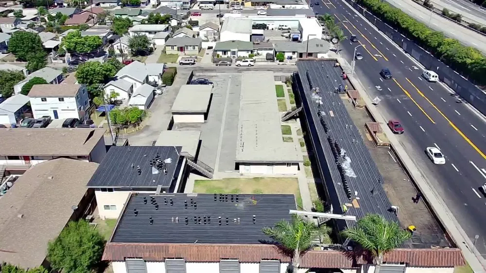 Slide of Queen Roofing