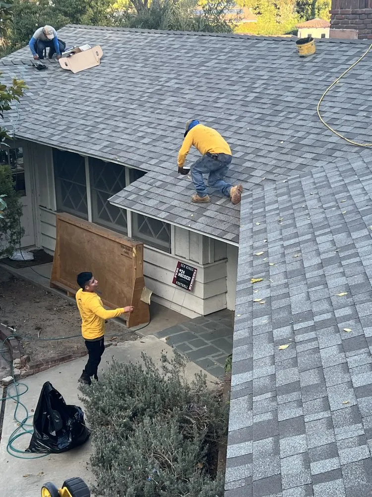 Slide of Queen Roofing