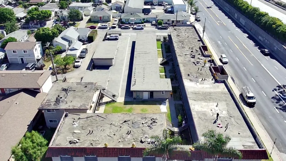 Slide of Queen Roofing