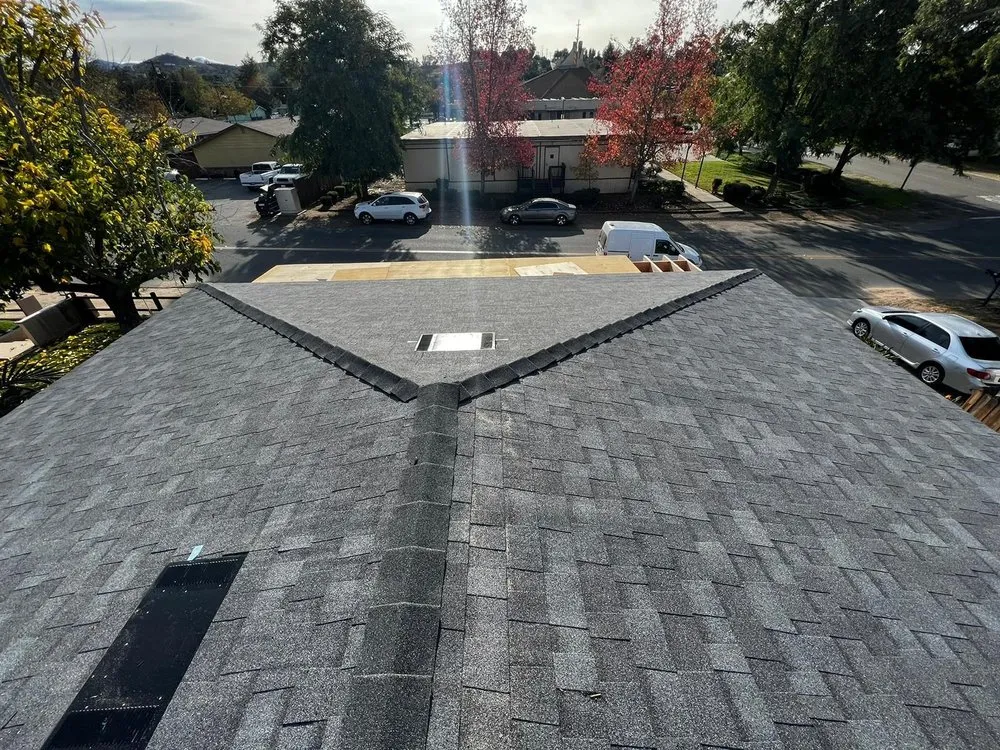 Slide of Queen Roofing