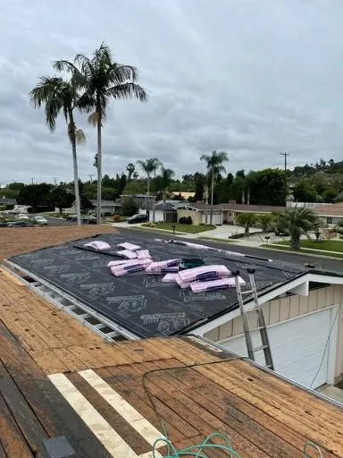 Slide of Queen Roofing