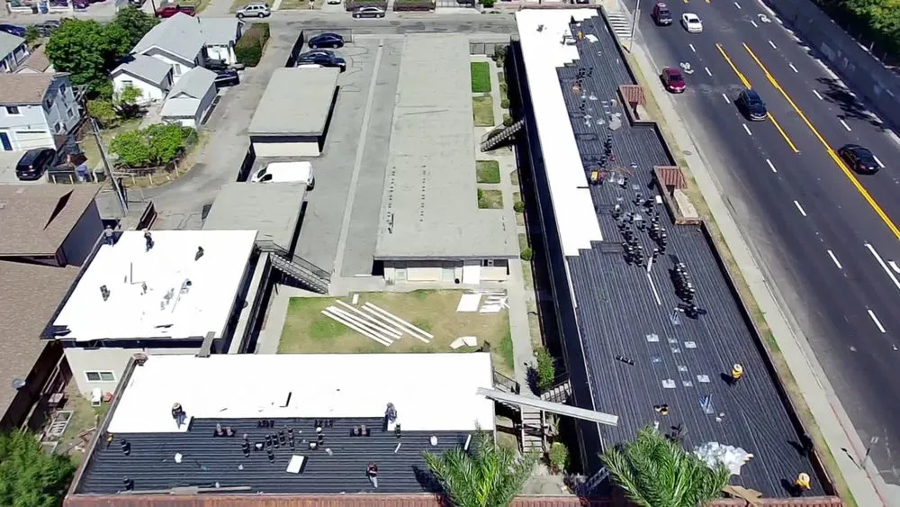 Slide of Queen Roofing